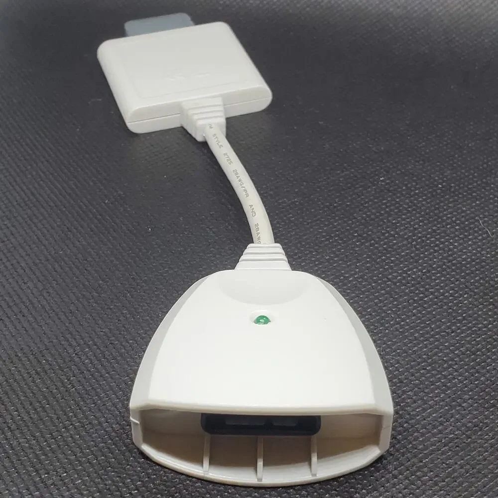white adapter cable for the Xbox 360 console